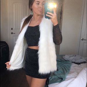 White fuzzy vest